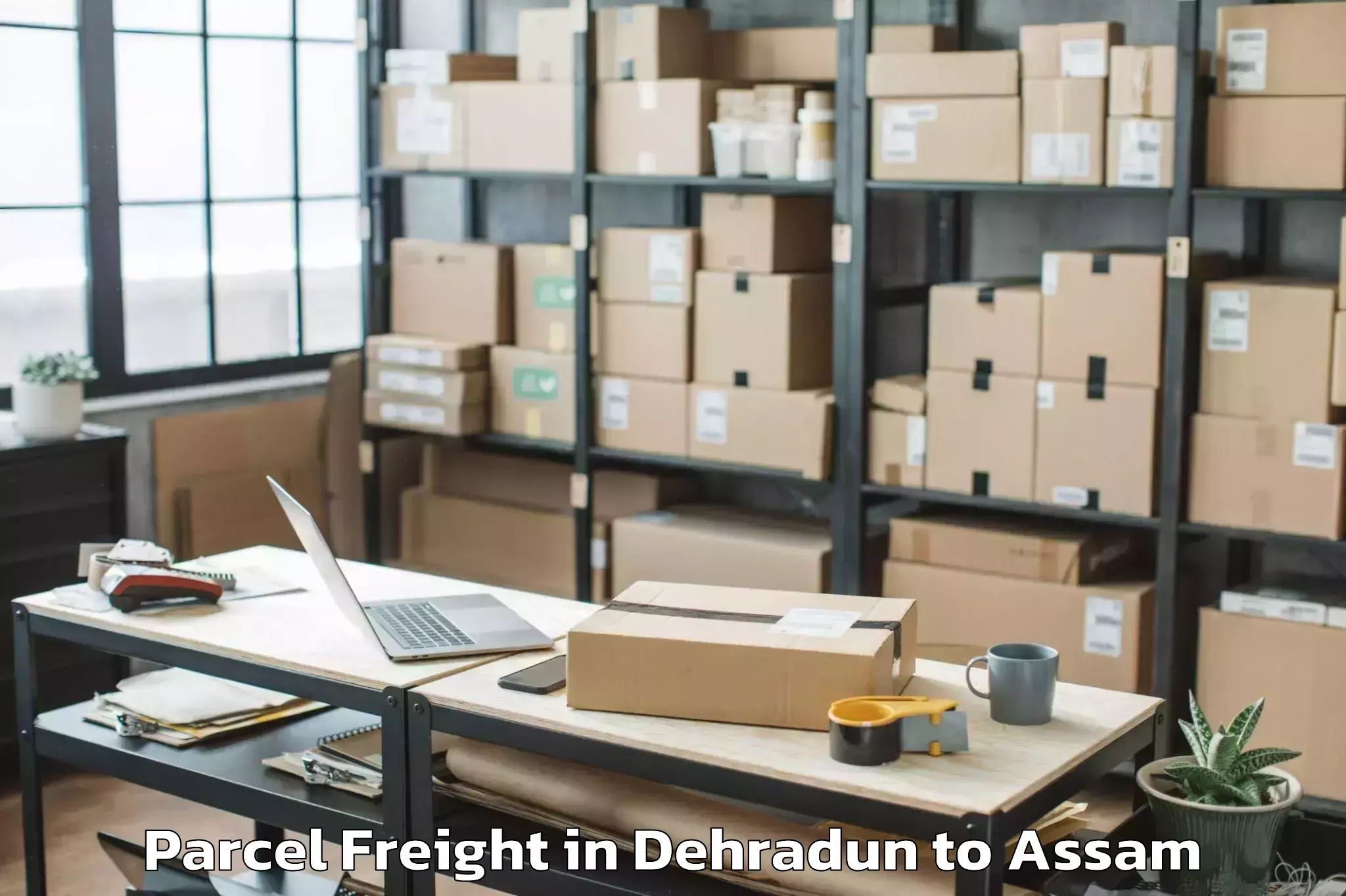 Discover Dehradun to Moranha Parcel Freight